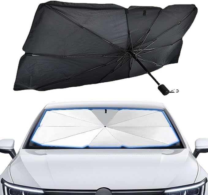 Black umbrella folded above a white car windshield.